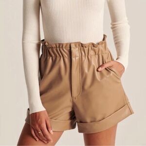 NWT! Abercrombie and Fitch Faux Leather Shorts 
High waist, tan.
Never worn!